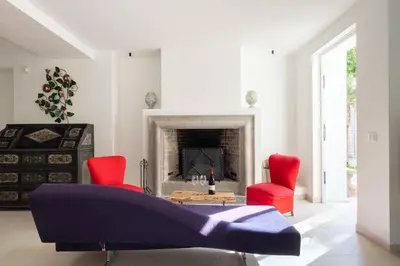 a living room with a couch and a table at Casa Iole by DomuSicily in Mondello