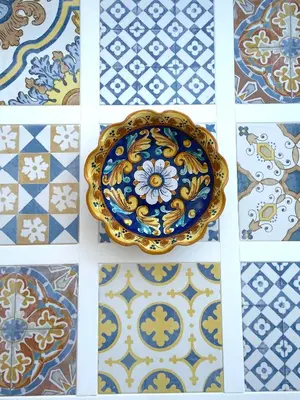 a group of different types of tiles on a wall at Casa Sole in San Vito lo Capo