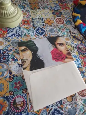 a picture of a man and a woman on a bed at Relais dei Mori Home Palermo in Casteldaccia