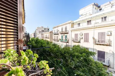 a view of a city street with buildings at Casa Dante with Balcony by Wonderful Italy in Palermo