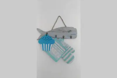 a cupcake ornament hanging on a wall at Sul mare con spiaggetta privata vicino a Cefalù. in Buonfornello