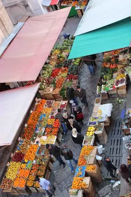 an overhead view of a market with fruits and vegetables at Residence Il Capo in Palermo