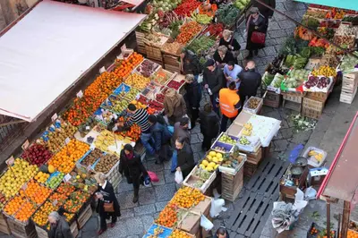 an overhead view of a market with people walking around at Residence Il Capo in Palermo