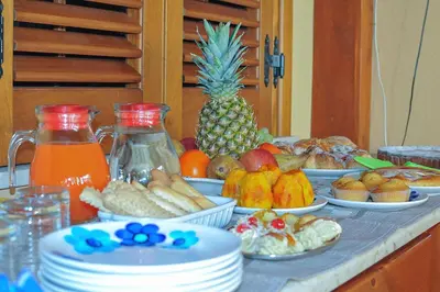 a table with a bunch of different types of food at Cascina degli Ulivi in Castelluzzo