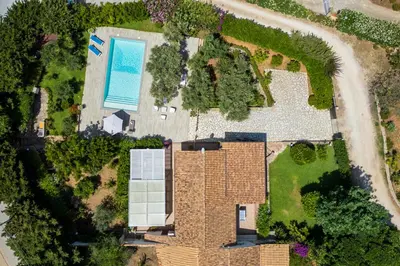 an aerial view of a house with a swimming pool at VILLA HIBISCUS in Castellammare del Golfo