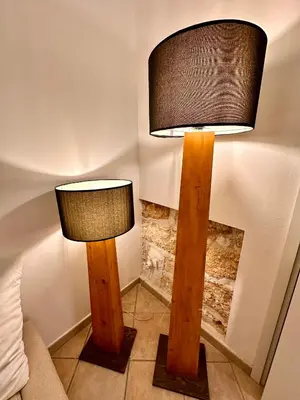 two lamps sitting next to a bed in a room at CASE VANELLA GRANDE aspra Bagheria in Bagheria