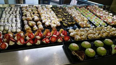 a display case with many different types of food at CASE VANELLA GRANDE aspra Bagheria in Bagheria