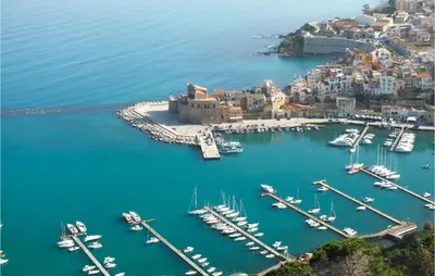 an aerial view of a harbor with boats in the water at Mansarda Belvedere in Alcamo Marina