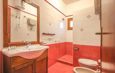 a bathroom with a sink and a toilet and a shower at Pietro 3 in San Vito lo Capo