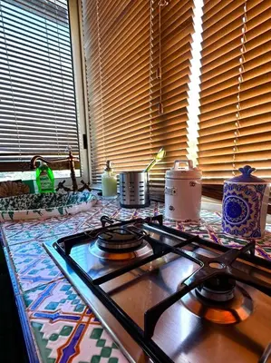 a stove top oven sitting in a kitchen next to a window at Casa Lunastella Locazione Turistica in Mondello