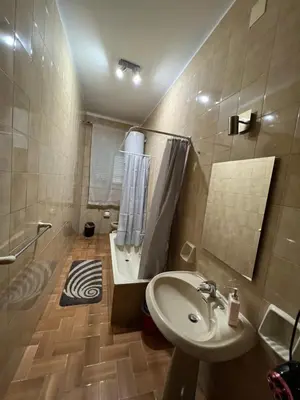a bathroom with a sink and a shower at House Corso Calatafimi in Palermo