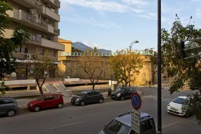 a group of cars parked on the side of a street at Casa del Vinile in Palermo