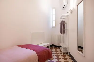 a living room with a couch and a table at Casa Rorro' nei pressi di Via Roma by Wonderful Italy in Palermo