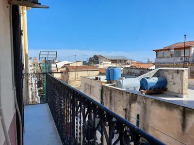 a balcony with a view of a city at Lovely Apartment in the City Centre in Palermo