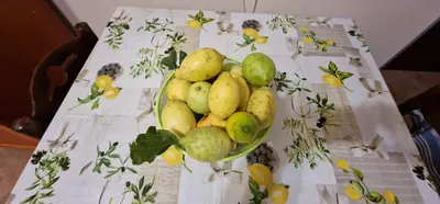 a bowl of pears sitting on a table at CASA IL LIMONE 300M MARE PARK e GIARDINO PRIV WIFI in San Vito lo Capo