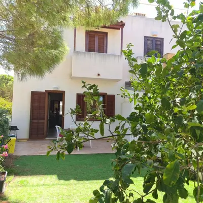 a view of a house from the garden at CASA IL LIMONE 300M MARE PARK e GIARDINO PRIV WIFI in San Vito lo Capo