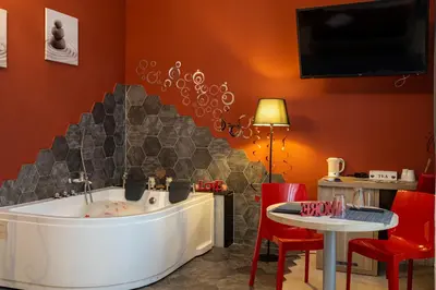 a bath tub in a room with a stair at Exclusive in Palermo