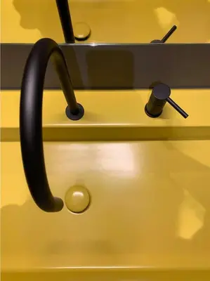 a yellow desk with a microphone on top of it at The347, Diletta in Palermo