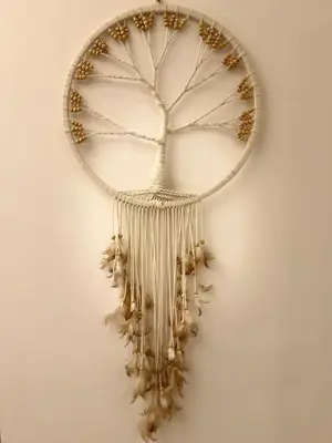a dream catcher hanging on a wall at Lux Apartment in Historical Center of Palermo in Palermo