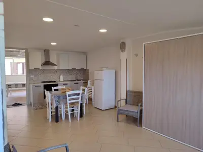 a bathroom with a sink and a toilet at Terrazza Solemar -four rooms in Castellammare del Golfo