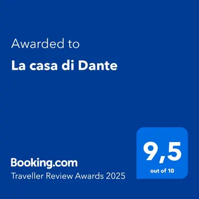 a blue screen with the text awarded to la casa del drink at La casa di Dante in Palermo