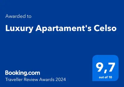 a blue sign with the words luxury apartmentsolean at Luxury Apartament's Celso in Palermo