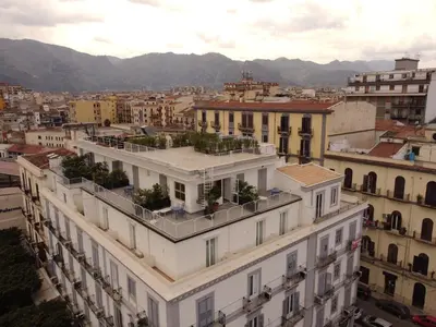 an aerial view of a city with buildings at Attico 37 - Queen room con terrazza privata in Palermo