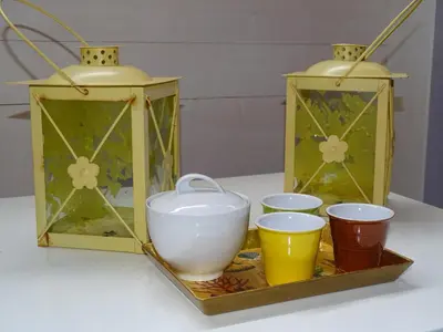 a set of three containers and cups on a table at CASE PUNTA MONACO by Trerose Properties con wi-fi e posto auto privato gratuito in San Vito lo Capo