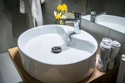 a white sink in a bathroom with a mirror at Residence Torremuzza - Charming House In The Heart Of Palermo with lovely view in Palermo