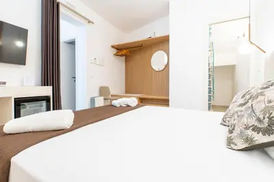 a bedroom with a bed and a fireplace at Bed and Breakfast Nilu' in Castellammare del Golfo