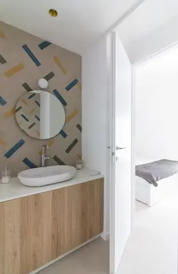a bathroom with a sink and a mirror at La casetta in centro storico: Pantelleria 9 in Palermo