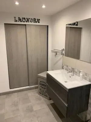 a bathroom with a sink and a mirror at Loft Nataly in Palermo