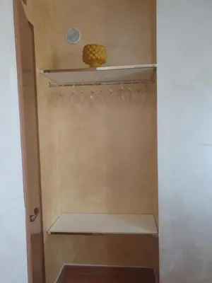 a closet with a shelf and a pineapple on it at Makari mare in Macari