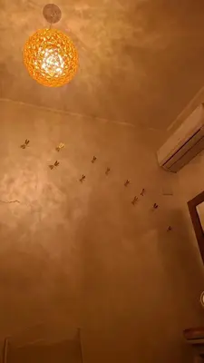 a group of planes are flying in the ceiling at Makari mare in Macari