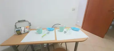 a table with a sink and two cups on it at Domus Rosaliae - Casa Vacanze in Palermo