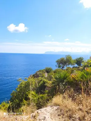 a view of the ocean from the top of a hill at CasaAntonietta in Alcamo