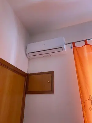 a room with a air conditioner on the ceiling at Holiday mode EVA in Partinico