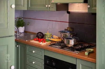 a kitchen counter with a stove and a sink at CIATU ME' Scirocco in Castellammare del Golfo