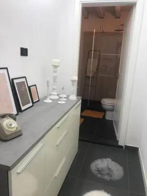 a bathroom with a shower and a toilet in a room at EDU' in Alcamo