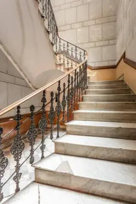 a set of stairs in a building at Nowhere Rooms in Palermo
