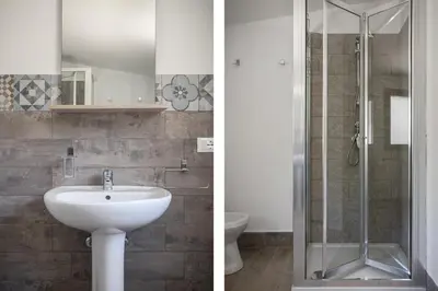 a bathroom with a sink and a shower at Grande Villa privata con piscina a Scopello in Castellammare del Golfo