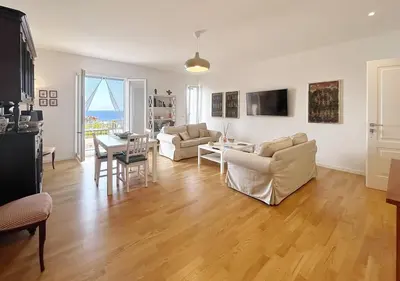 a living room with a couch and a table at Solemar Sicilia - Villa delle Rocce in Bagheria