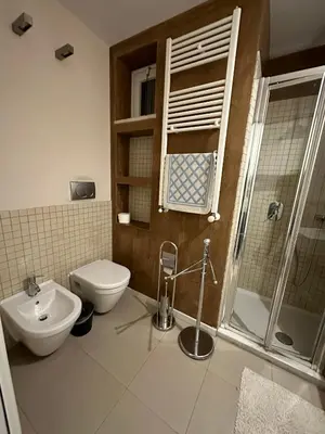 a bathroom with a toilet and a sink at Malusi B&B in Sferracavallo