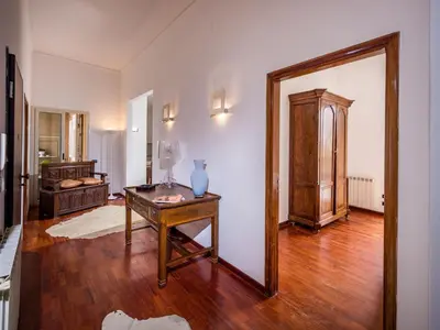 a living room with a table and a mirror at Apartment Casa dei Mori by Interhome in Terrasini