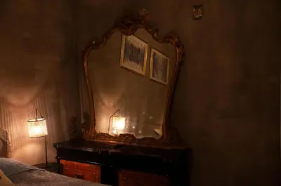 a bedroom with a bed with two pillows on it at Villetta Cicciuli in Altavilla Milicia