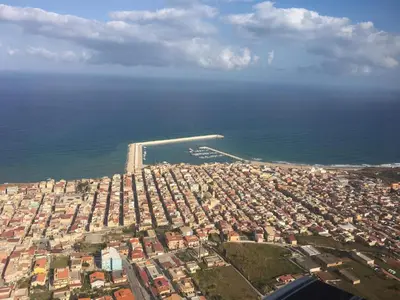 an aerial view of a city next to the ocean at Sunset House in Balestrate