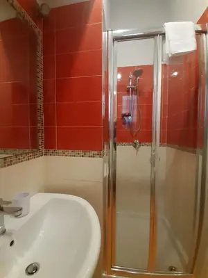 a bathroom with a shower and a sink at Affittacamere Ammirata in Palermo