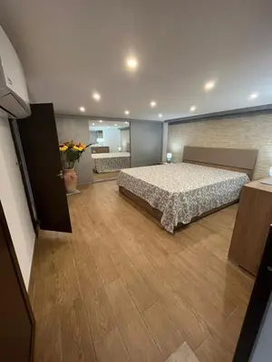 a bedroom with a large bed in a room at Casa da Francesca in Palermo