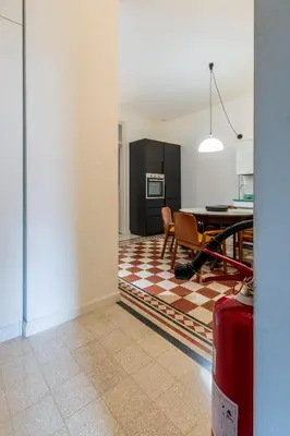 a bathroom with a white toilet and a sink at Faboulous Flat in Palermo