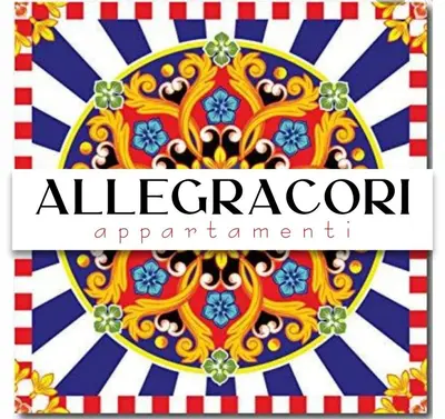 a group of three banners with a colorful mandala at Allegracori Appartamenti in Castellammare del Golfo